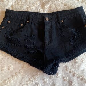 Black distressed shorts